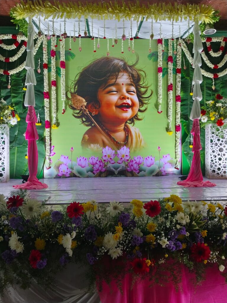 Hanging garlands and banana leaf panels around baby shower backdrop - Tindivanam, Villuppuram
