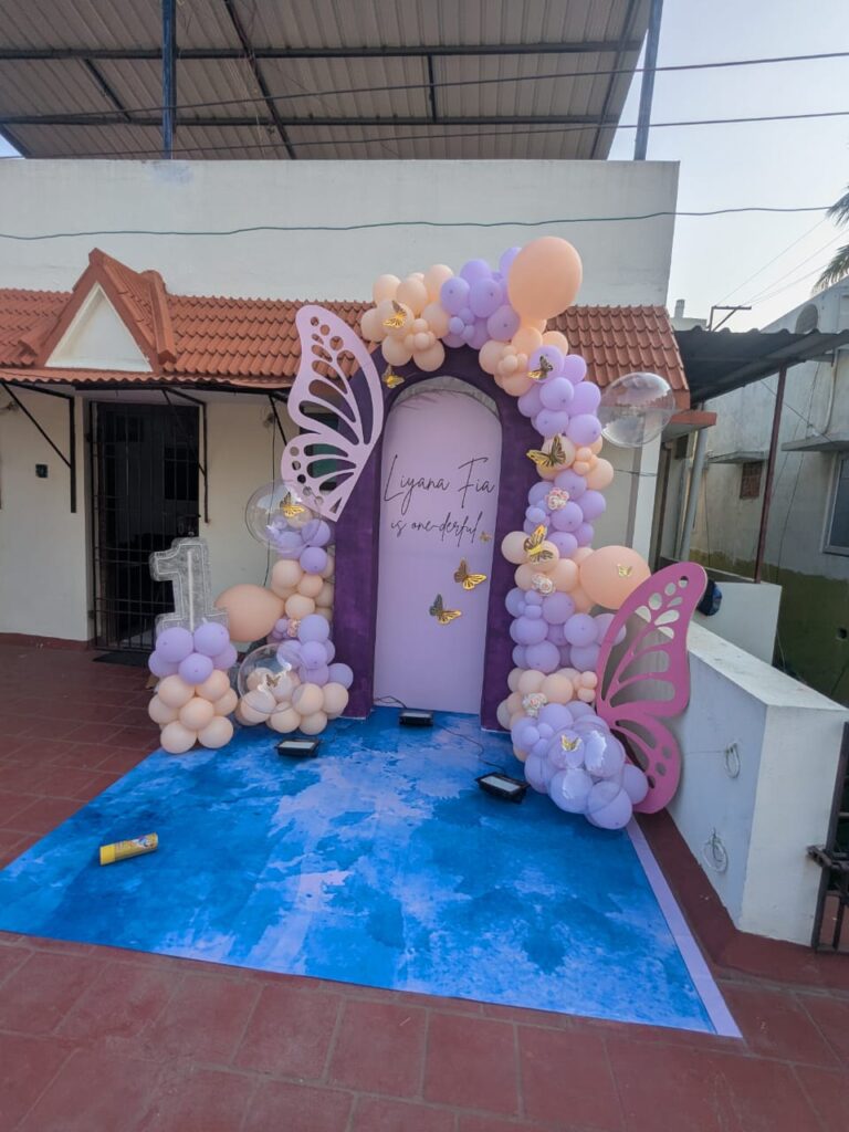 LED-lit number one balloon décor used in Liyana Fia’s birthday setup at Arumbakkam terrace.