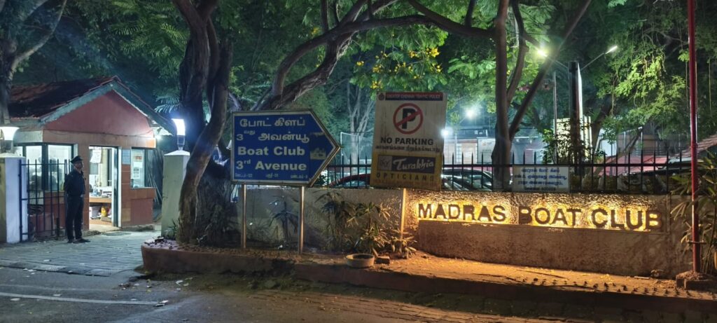 Alt: Madras Boat Club entrance sign at Boat Club Road Raja Annamalaipuram Chennai